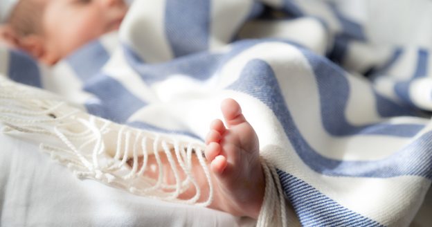 Header image of Baby in a blanket