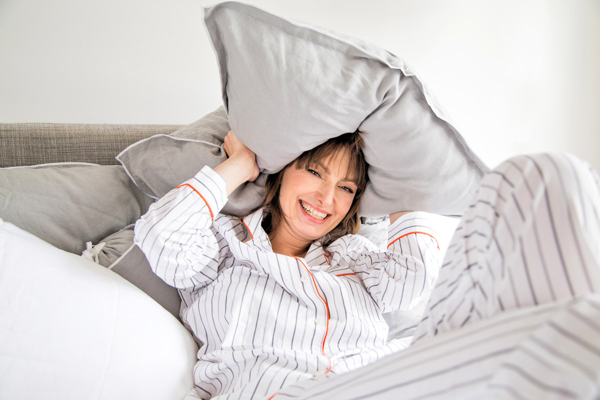 image of a woman in bed