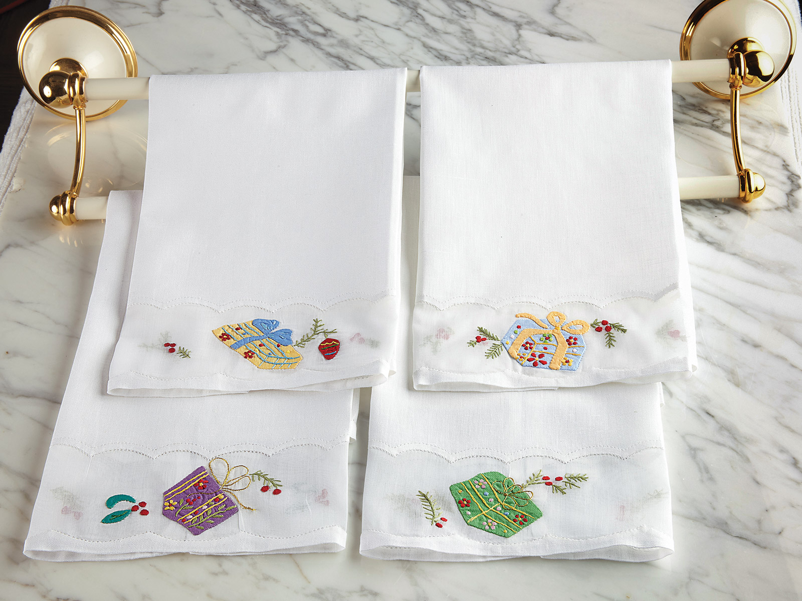 Image of the Holiday Cheer guest towel with festive embroidery and seasonal detailing