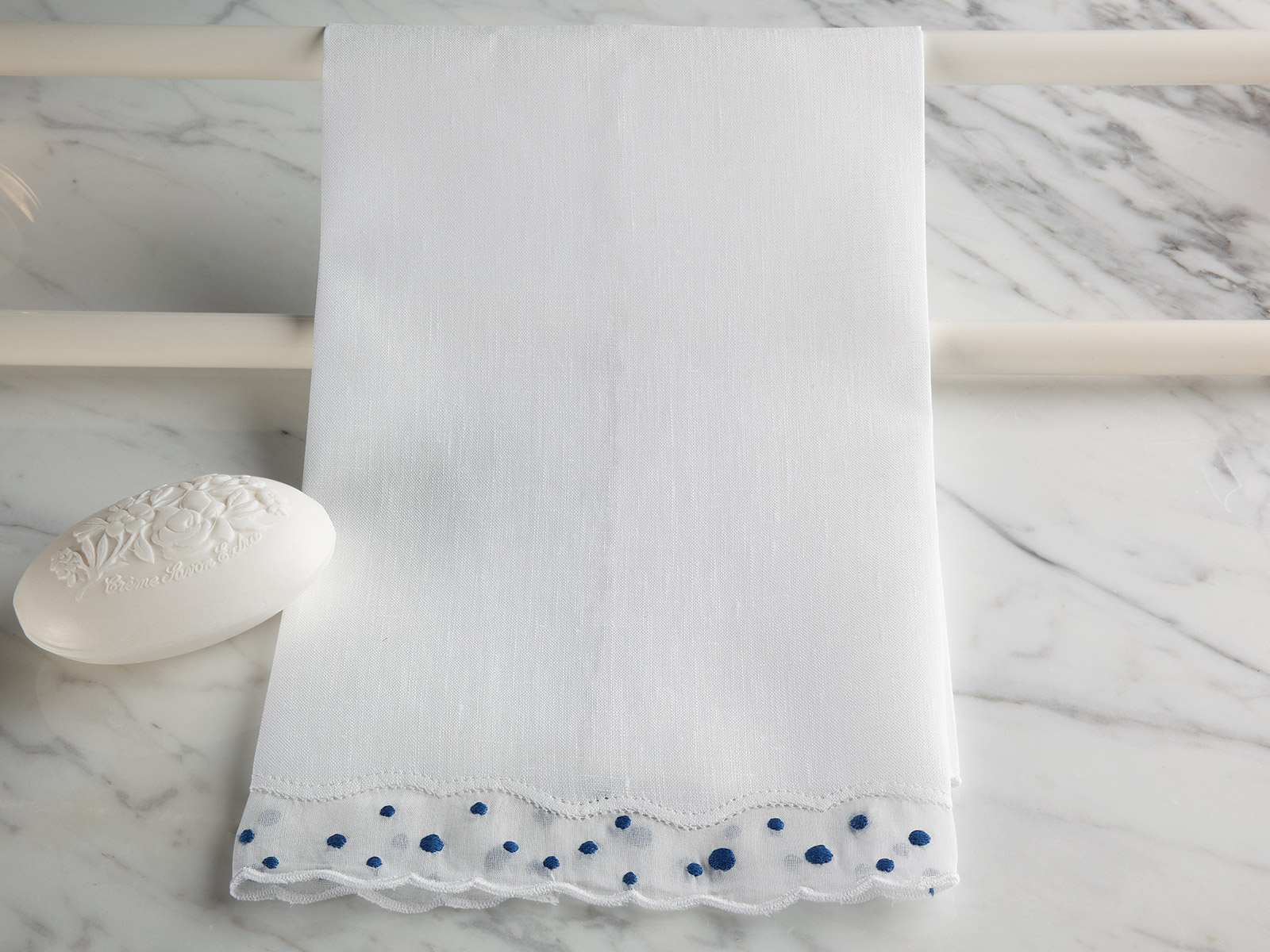 Image of the Manor House guest towel featuring traditional embroidery and timeless European styling