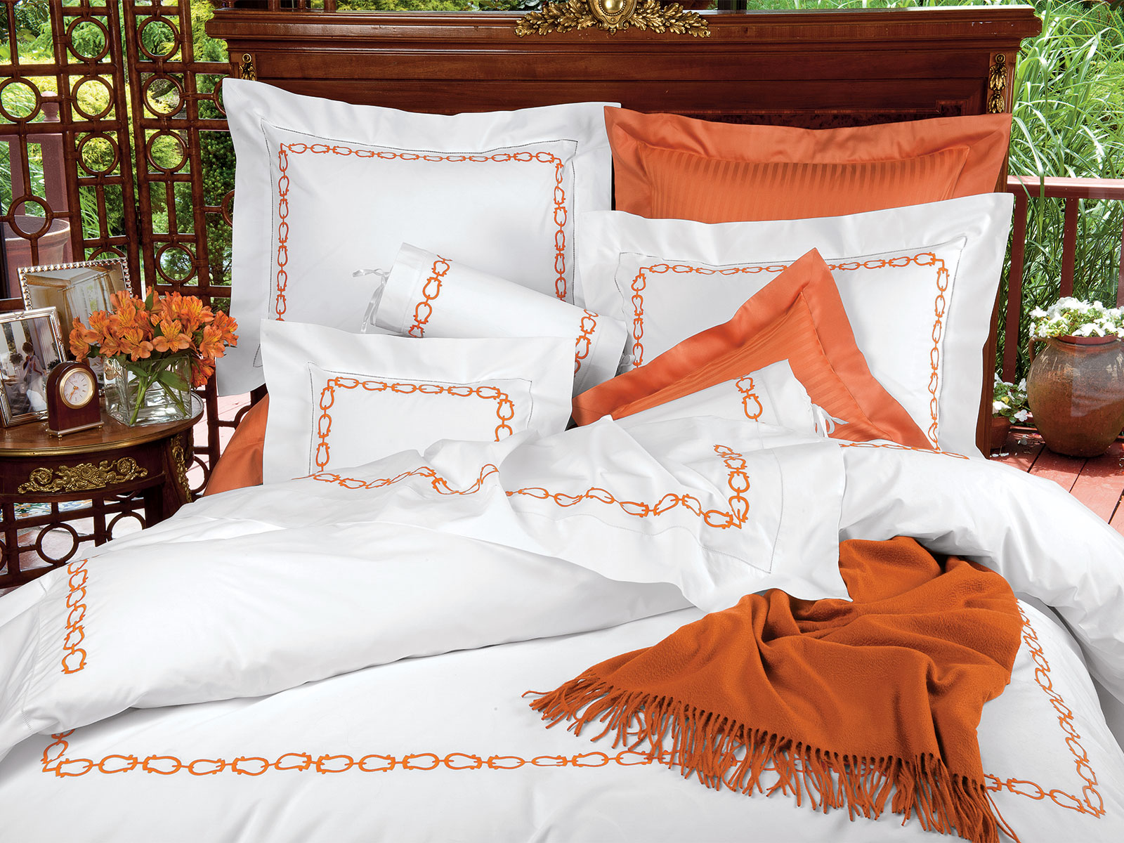 La Chaine bedding showcasing refined craftsmanship, subtle texture and an uncluttered neutral bedroom aesthetic.